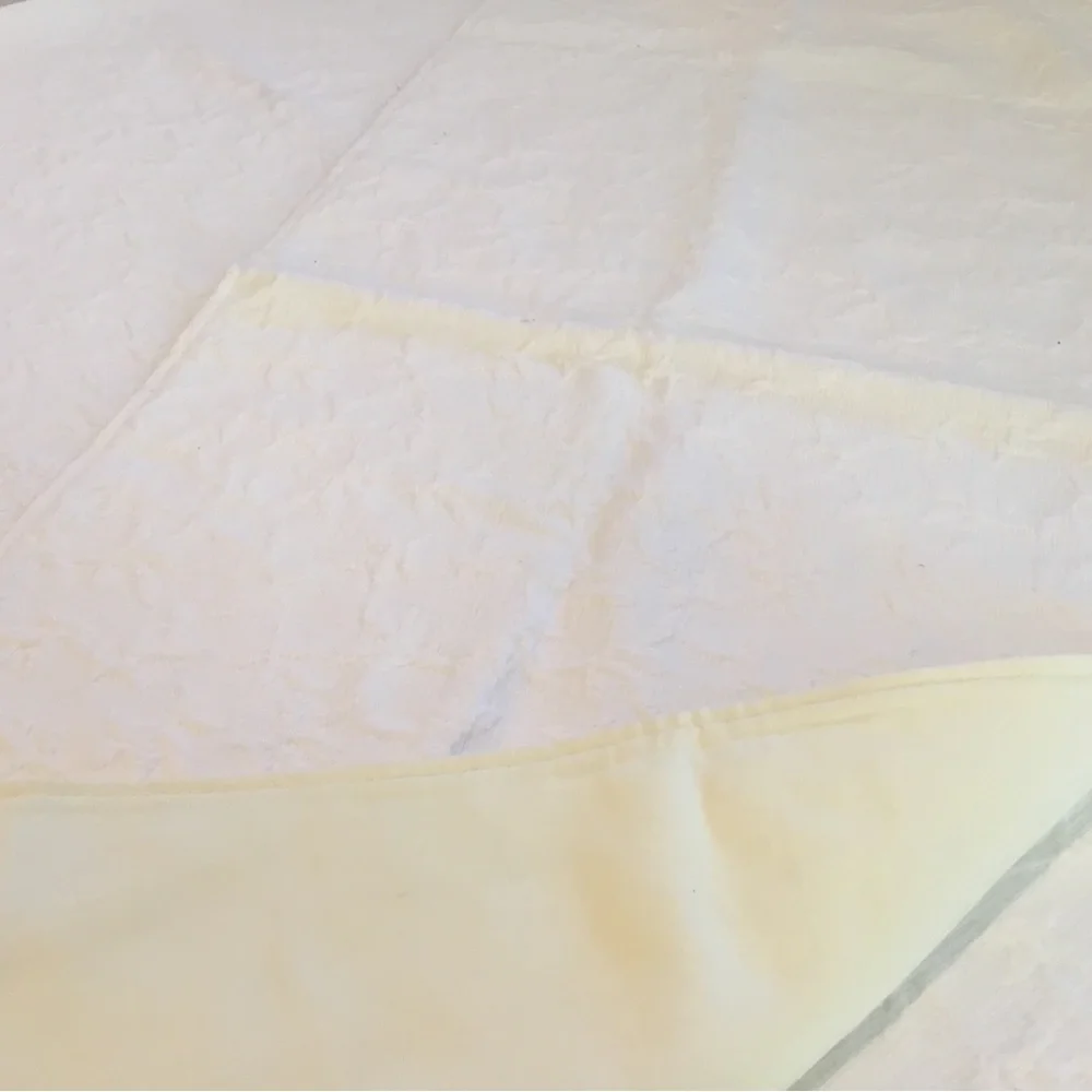 Headboard Slipcover in white matelasse fabric. Slip on. Scalding too